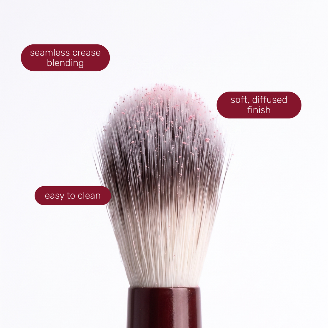 Brush head of the Boozyshop Flawless Blended Crease Brush with text labels about how to use it