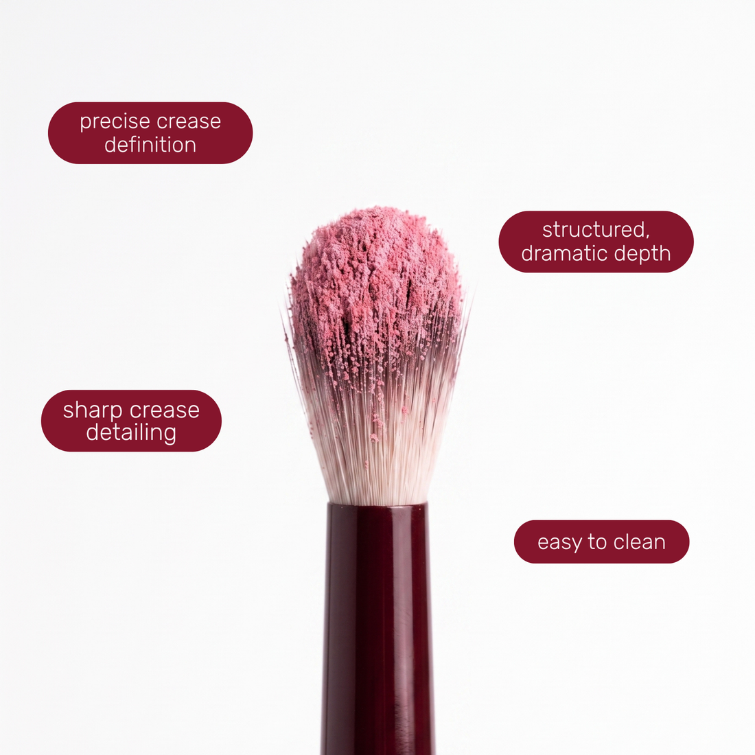 Brush head of the Boozyshop Flawless Defined Crease Brush with text labels about how to use it